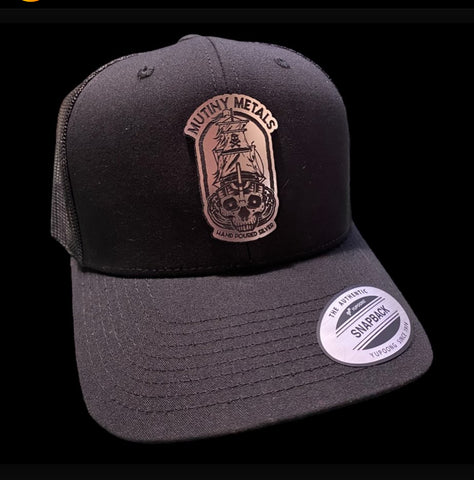 Mutiny Metals Snap Back style hat w/metal emblem.